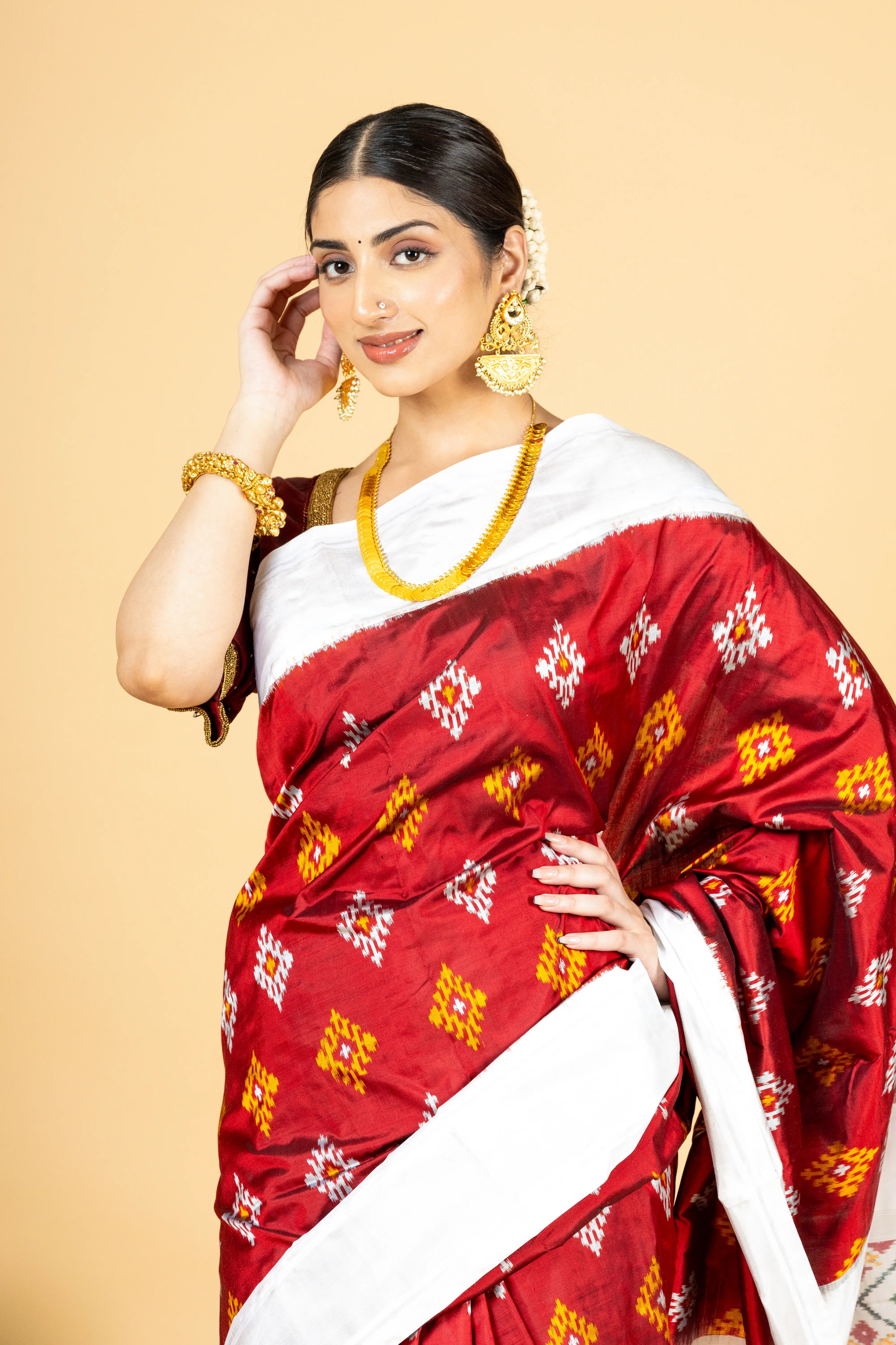 Dark Red Pochampally Saree With Beautiful Motifs And White Border