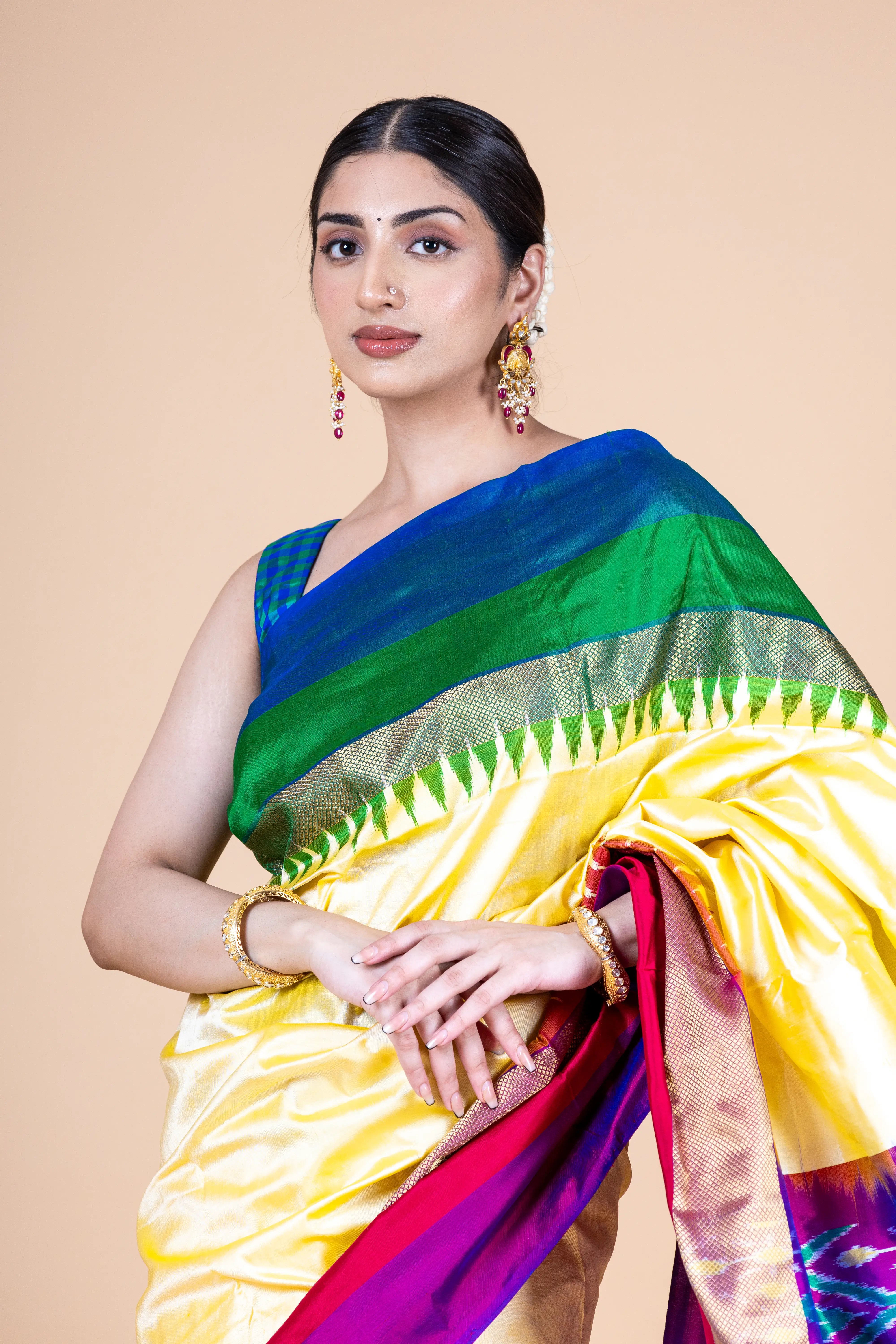 Light Yellow Pochampally Saree With Contrast And Bright Multi Color Border