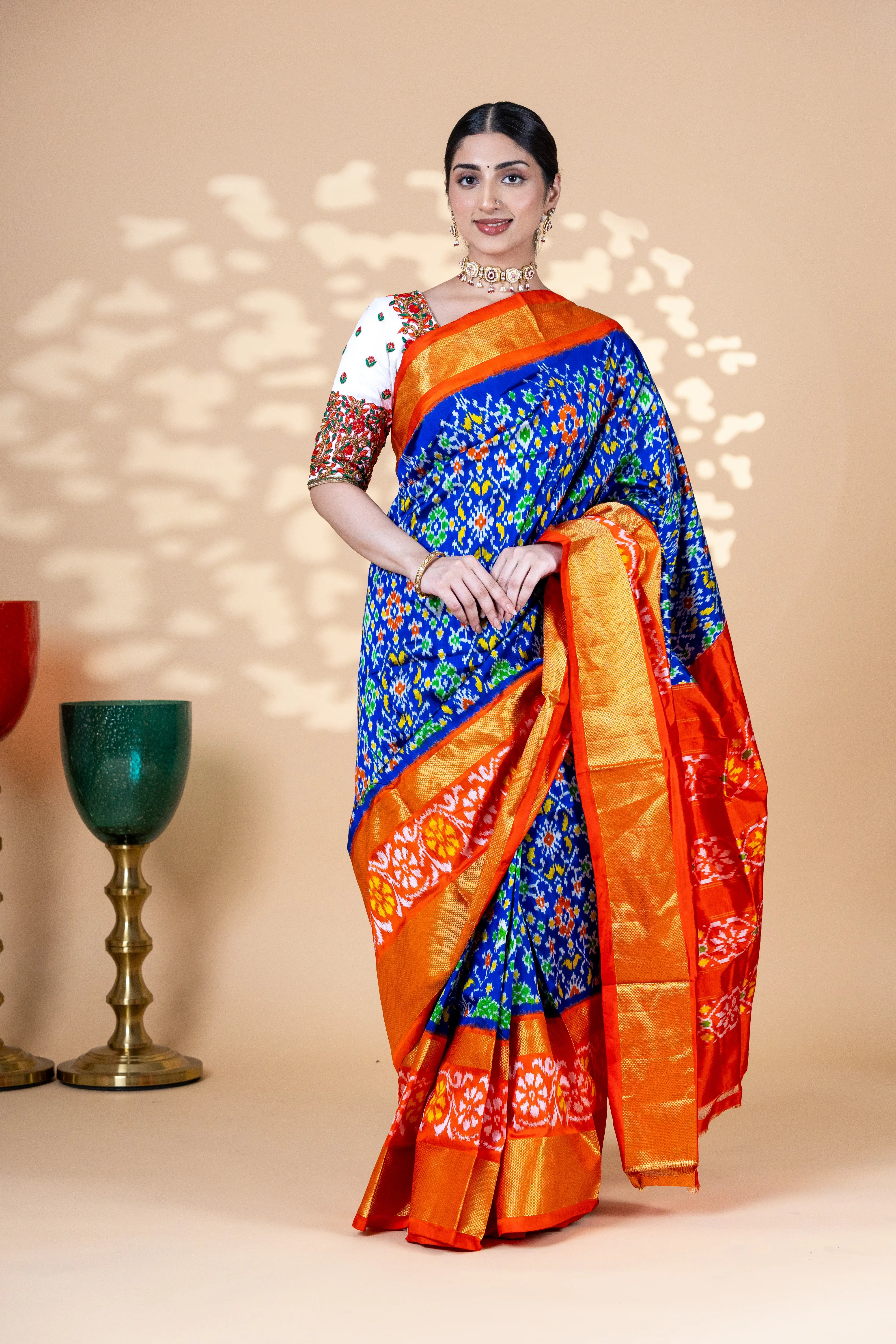 Blue Pochampally Silk Saree With Beautiful Ikaat Detailing And Bright Contrast Red Border
