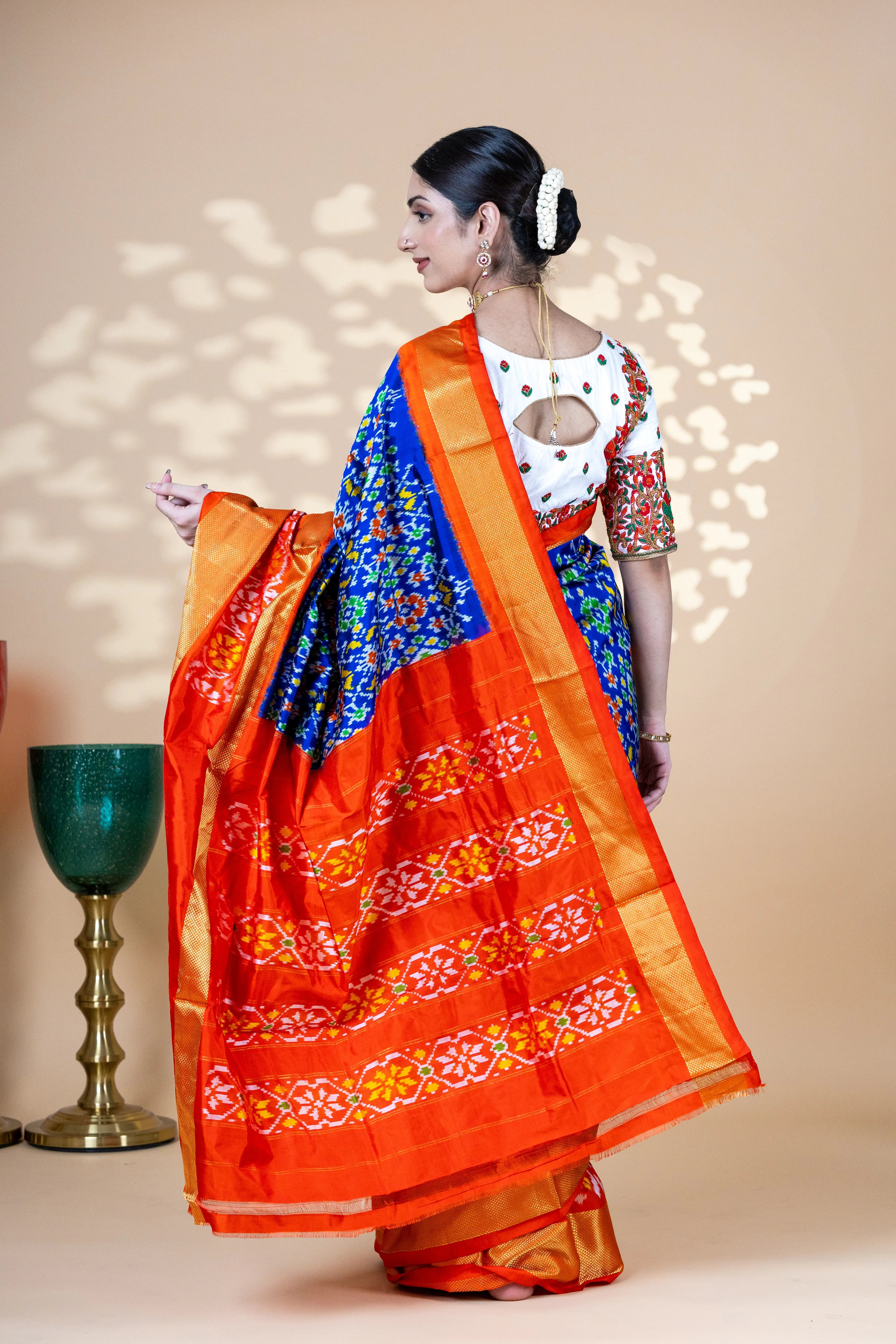 Blue Pochampally Silk Saree With Beautiful Ikaat Detailing And Bright Contrast Red Border