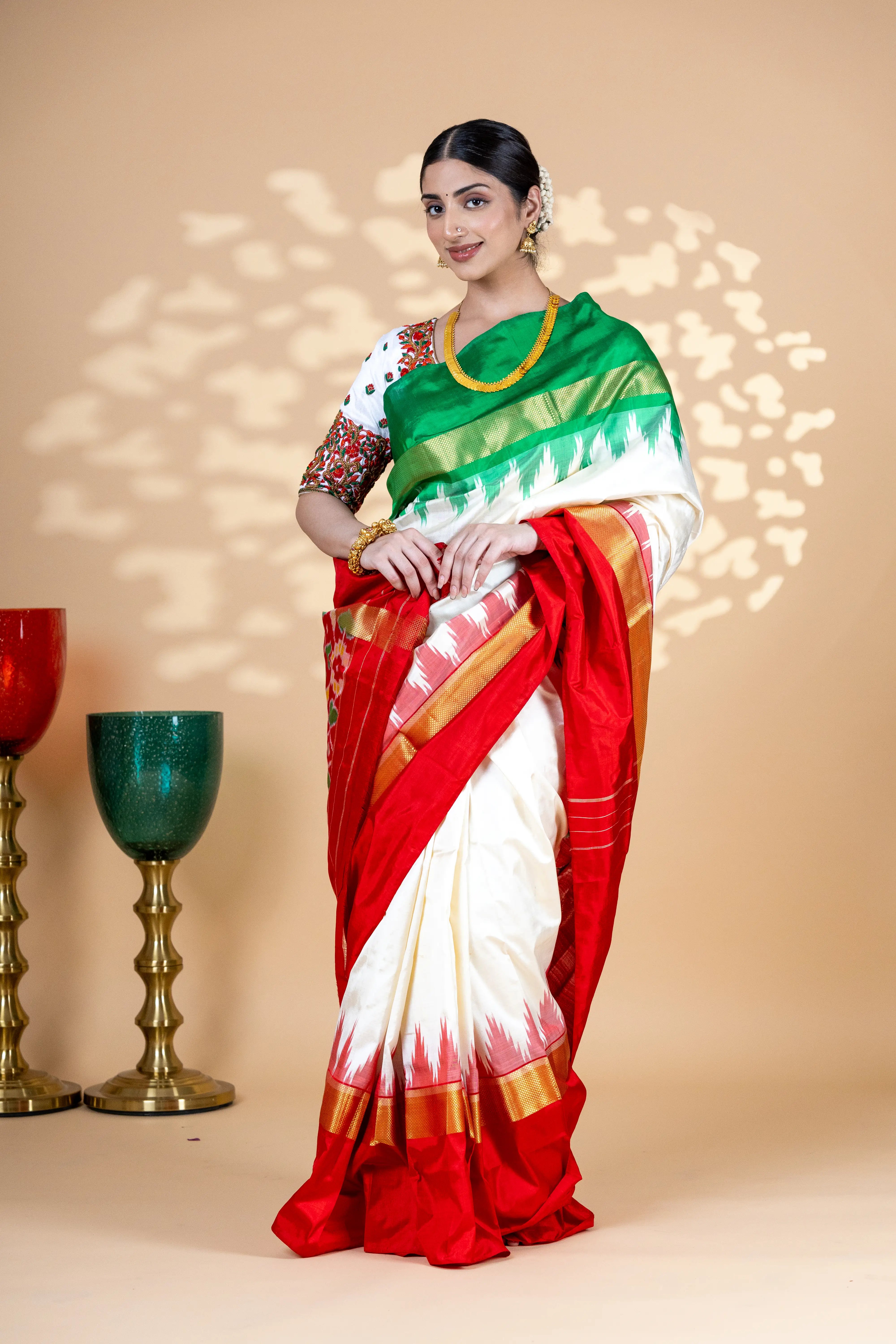 White Pochampally Saree With Contrast Red And Green Zari Border With Ikkat Detailing