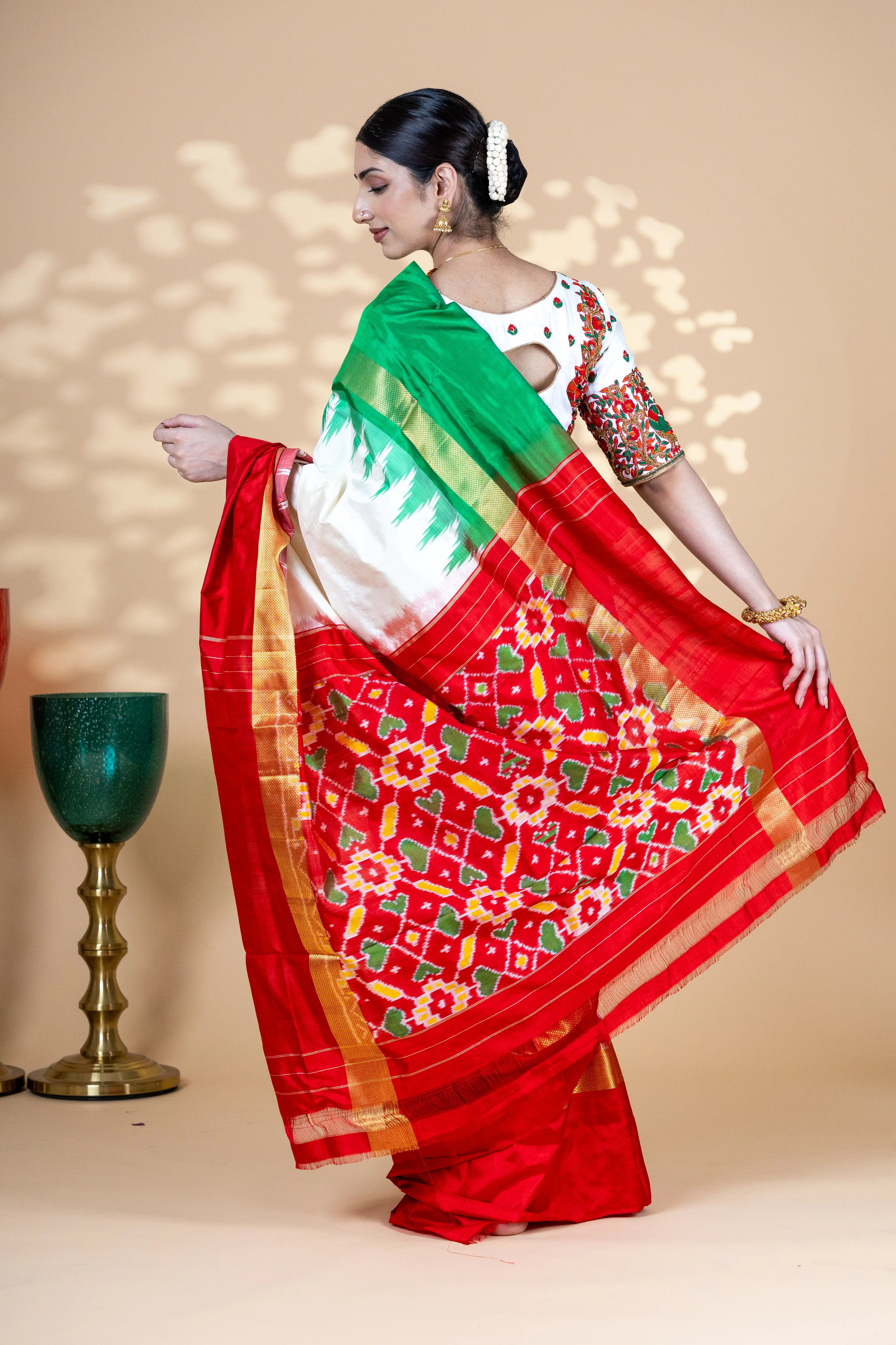 White Pochampally Saree With Contrast Red And Green Zari Border With Ikkat Detailing