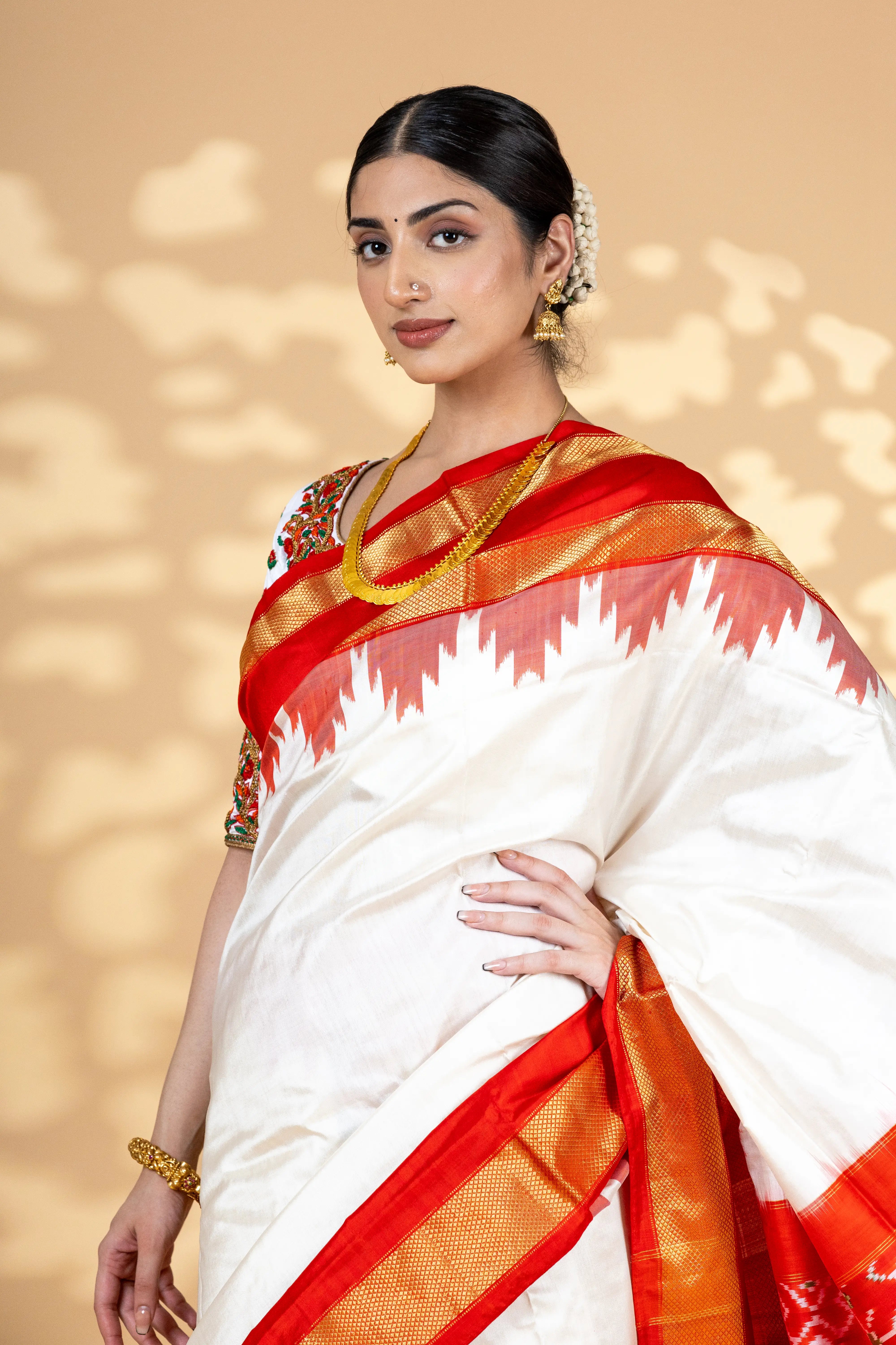 White Pochampally Saree With Contrast Red Zari Border With Ikkat Detailing