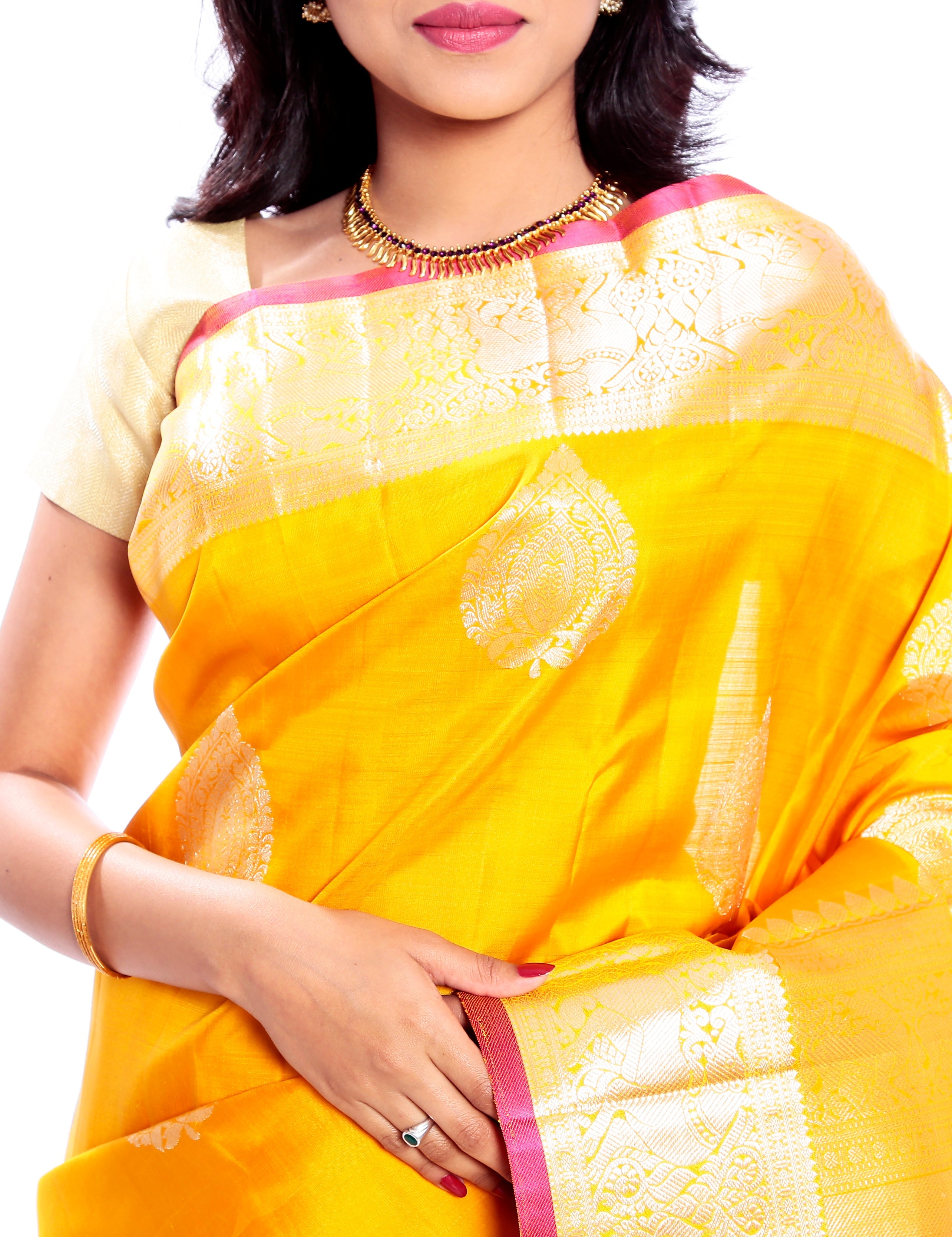 Kanchipuram Silk Saree in Yellow + Thilagam Motifs + Elegant Broad Border in Pure Zari with Yali Motifs