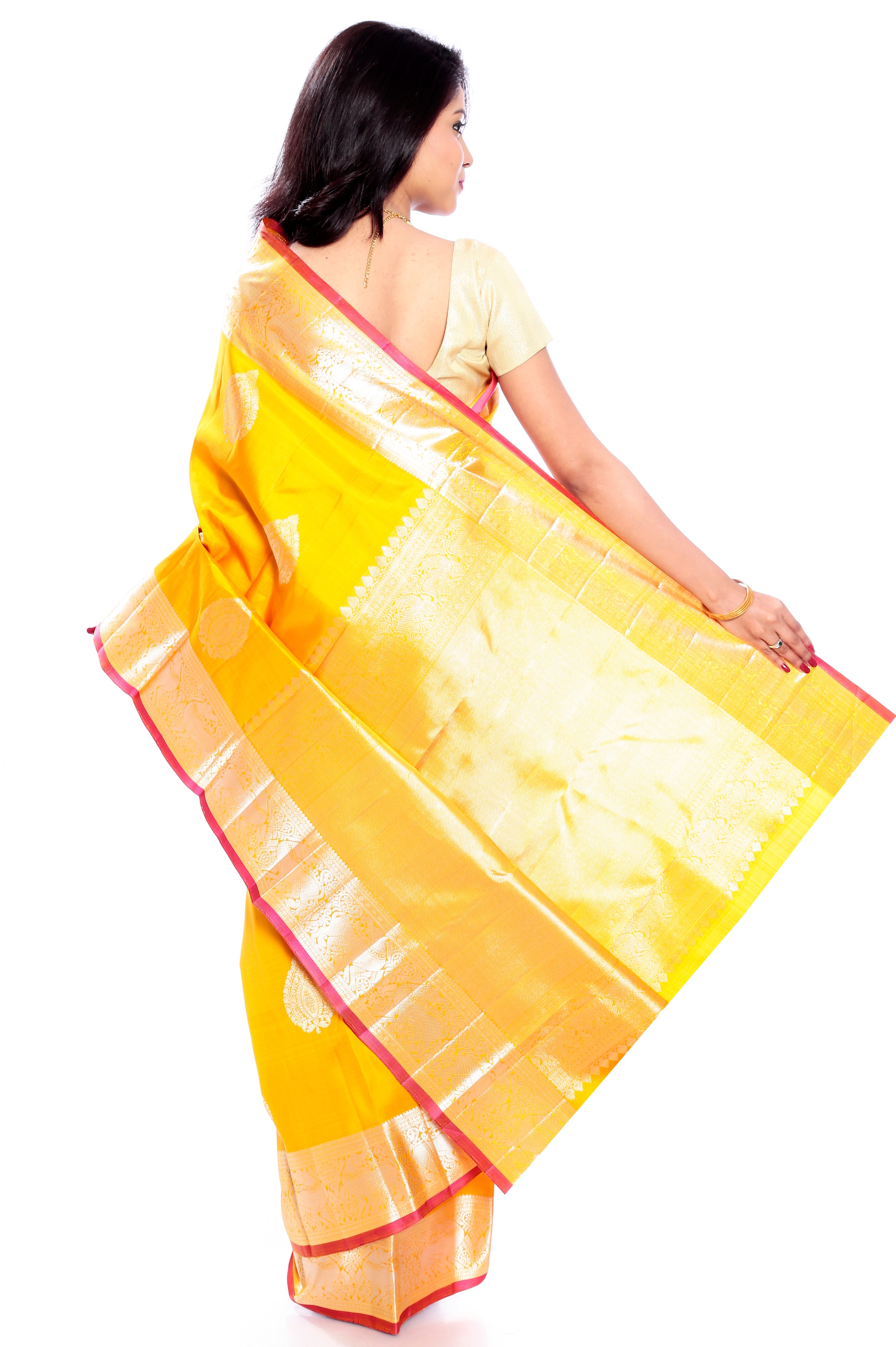 Kanchipuram Silk Saree in Yellow + Thilagam Motifs + Elegant Broad Border in Pure Zari with Yali Motifs