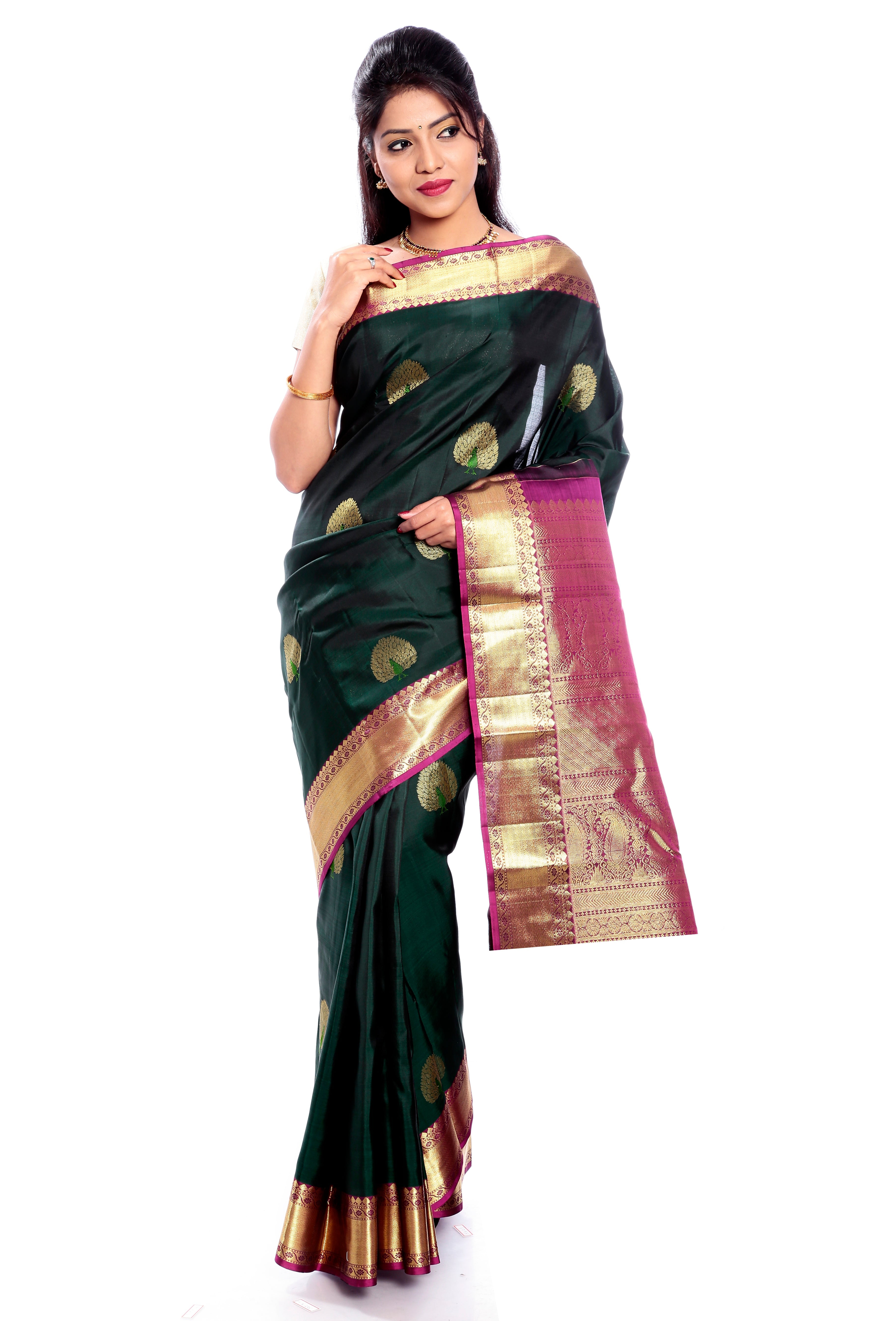 Dark Green kanjivaram silk saree with golden Border