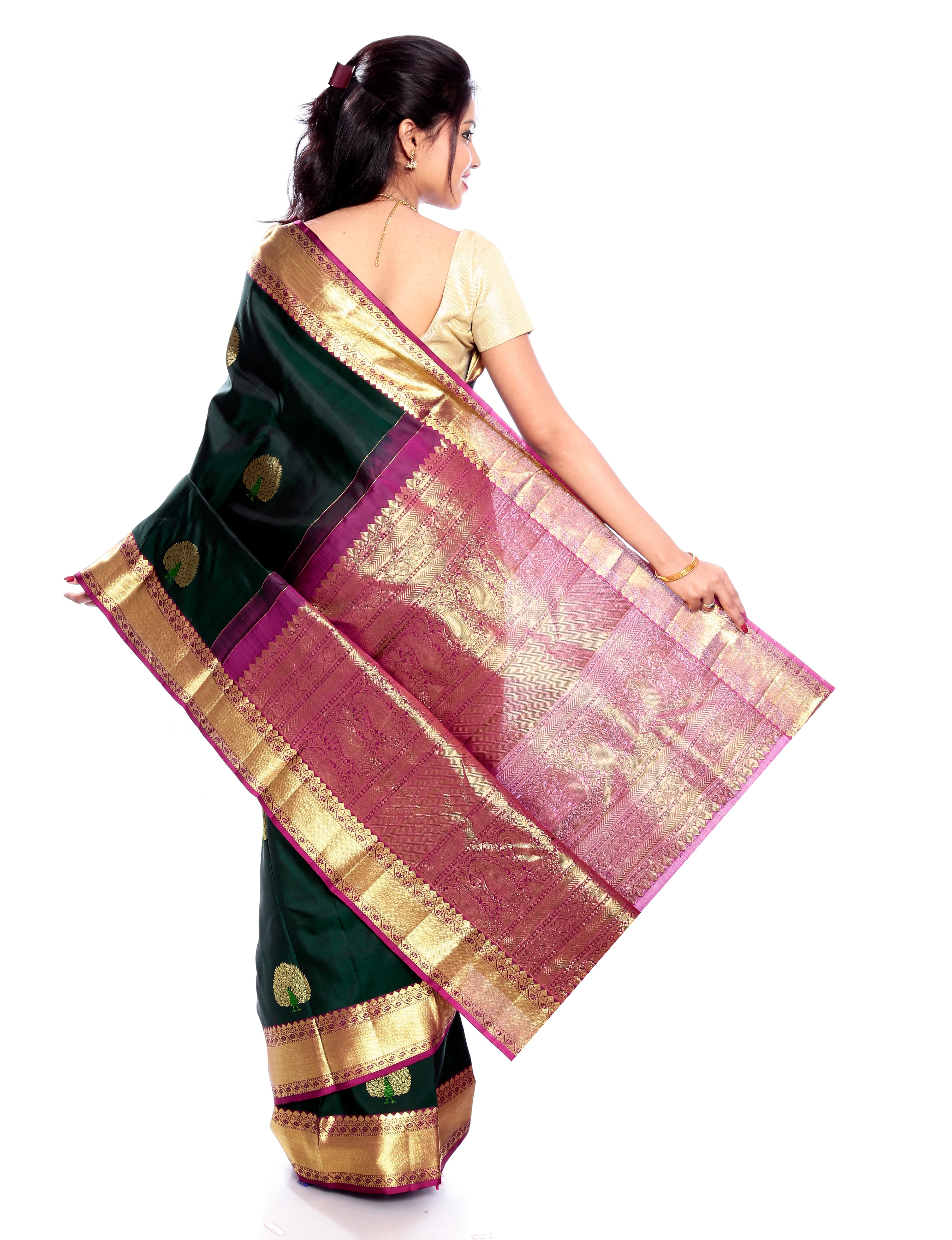Dark Green kanjivaram silk saree with golden Border