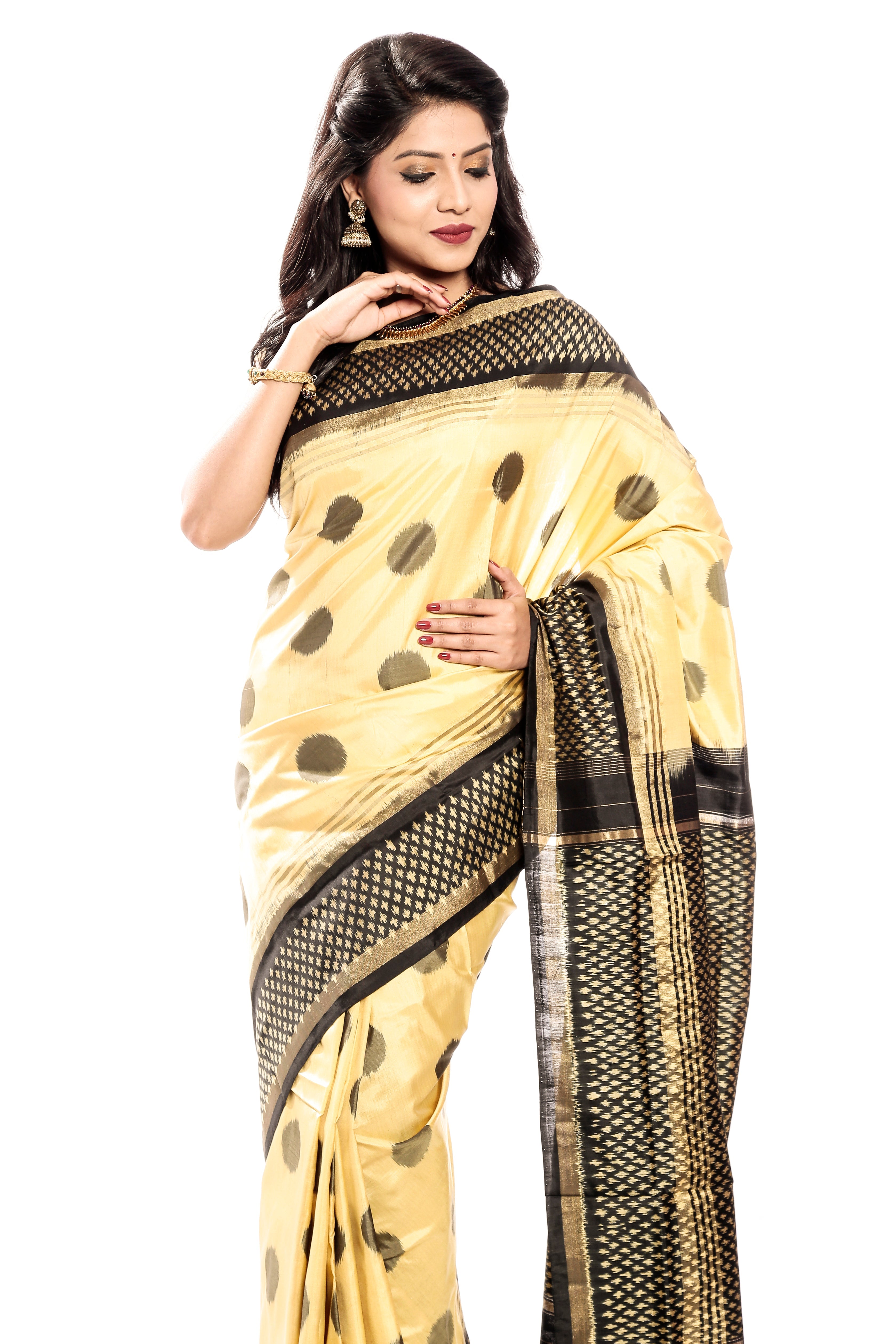 Pochampalli ikkat silk saree in cream